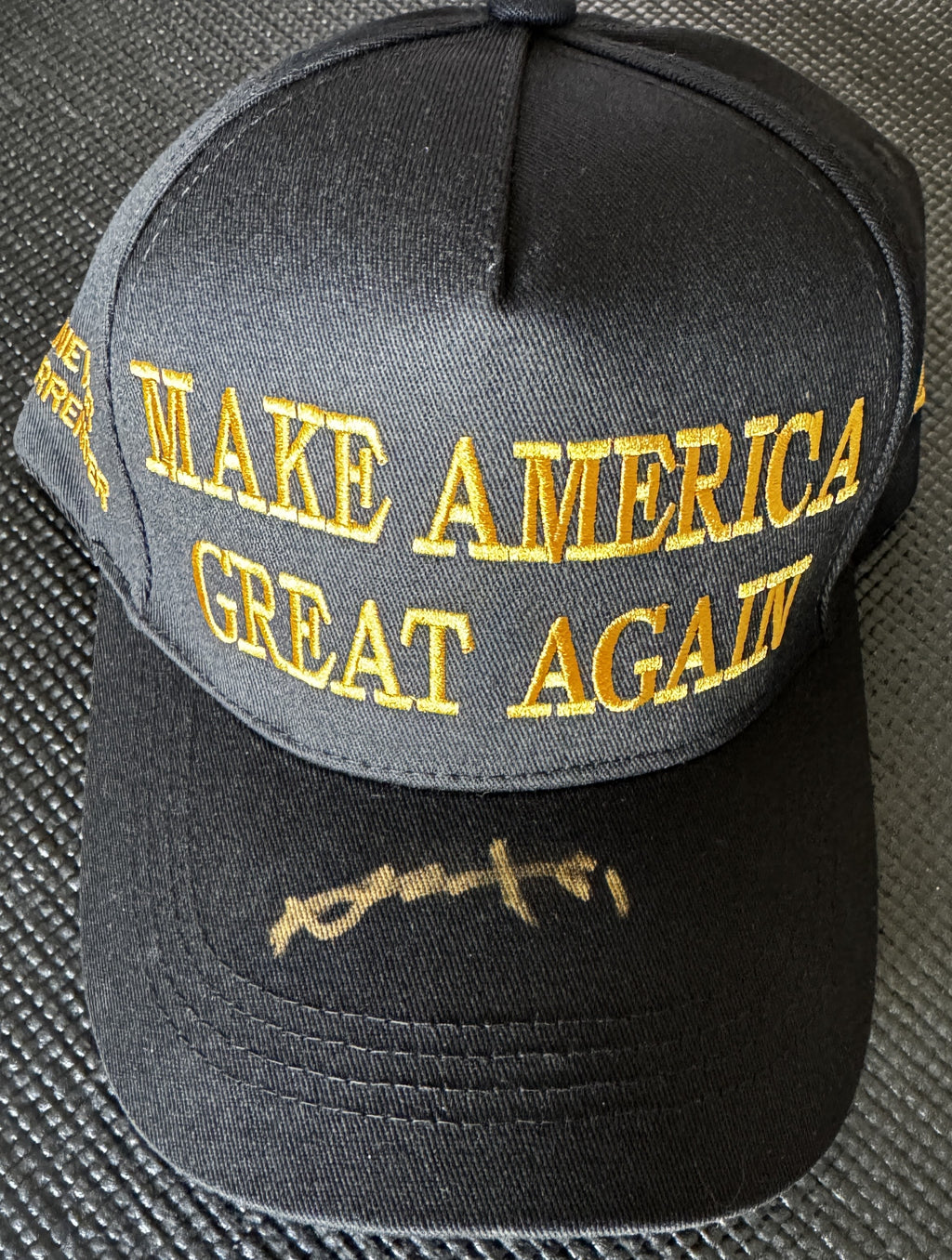 Antonio Brown Autographed MAGA Hat - Beckett Witnessed (Black Hat and Gold Ink)