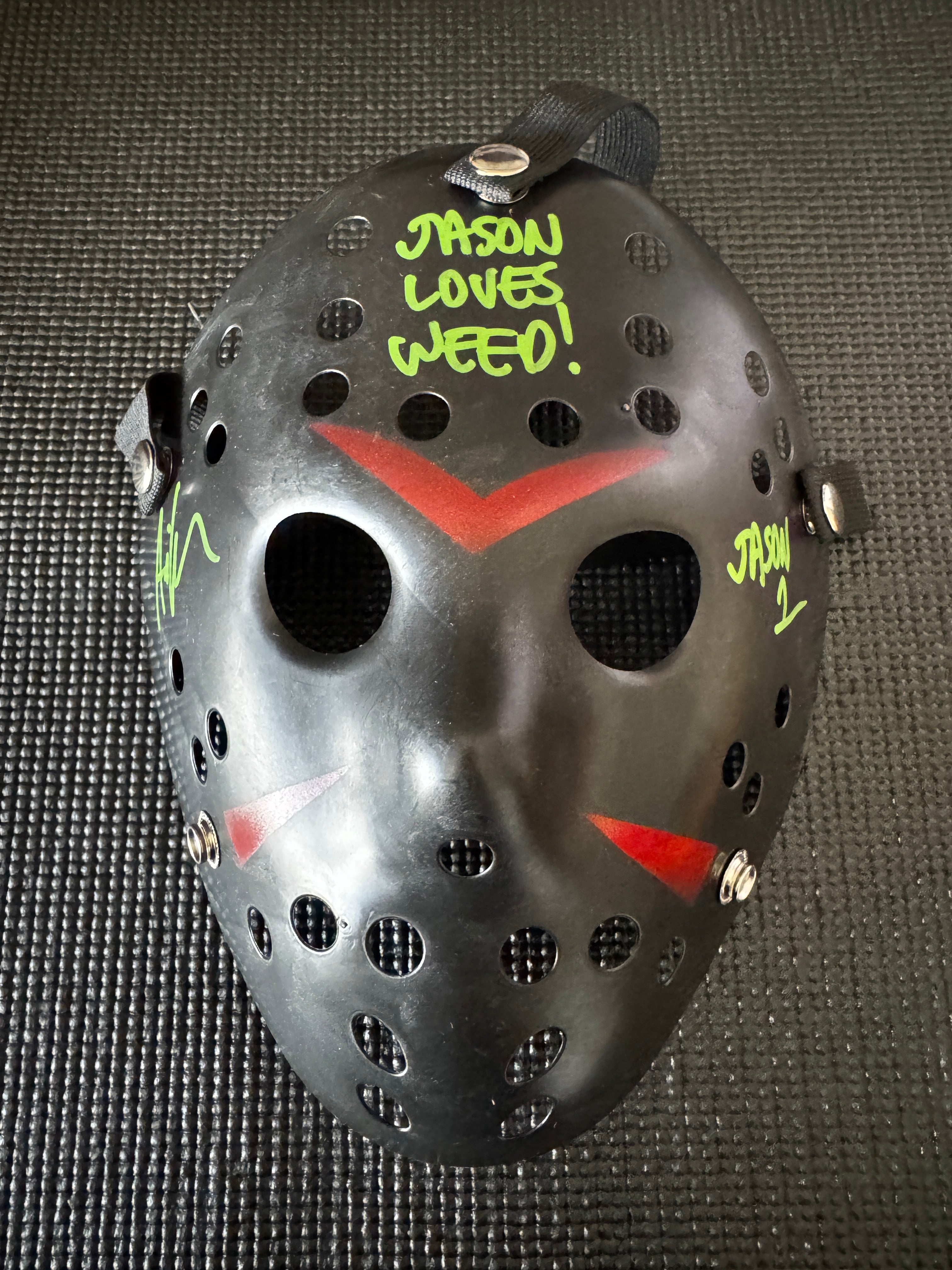 Friday the 13th Jason Mask Autographed by Ari Lehman. Beckett/W  (Black Mask, Jason Loves Weed W/ Green Ink)